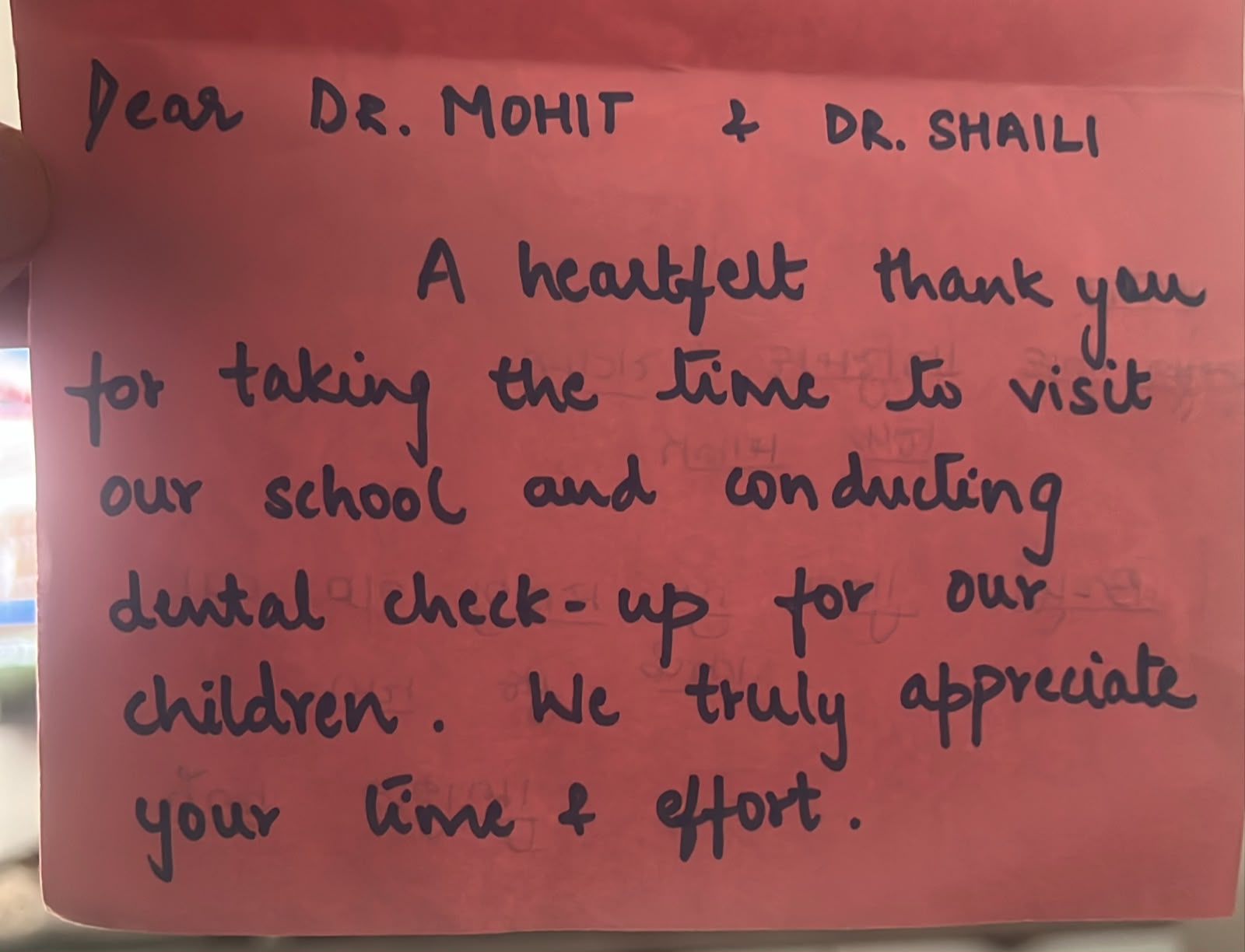 Handwritten thank-you card from Arya Vidya Mandir, Bandra West, to Dr. Mohit Bodhwani and Dr. Shaili Shah Bodhwani for the school dental check-up camp