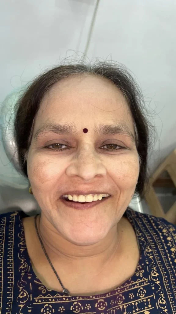 Smiling patient after treatment at The Smile Makers Dental Clinic