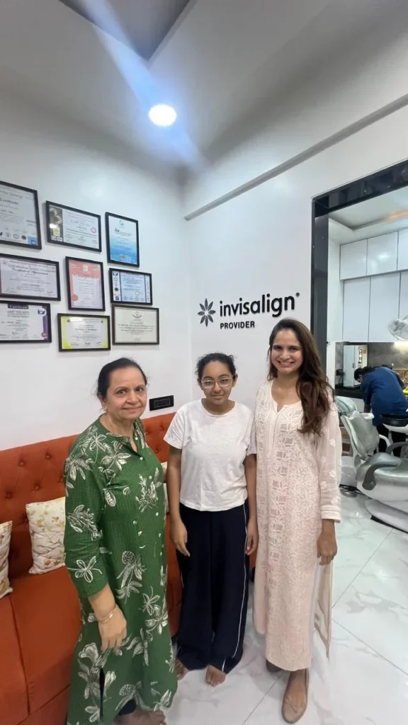 Patients at The Smile Makers Dental Clinic, an Invisalign Provider in Khar West