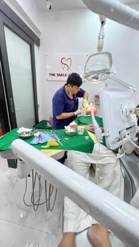 Dental procedure in progress in the operatory at The Smile Makers Dental Clinic