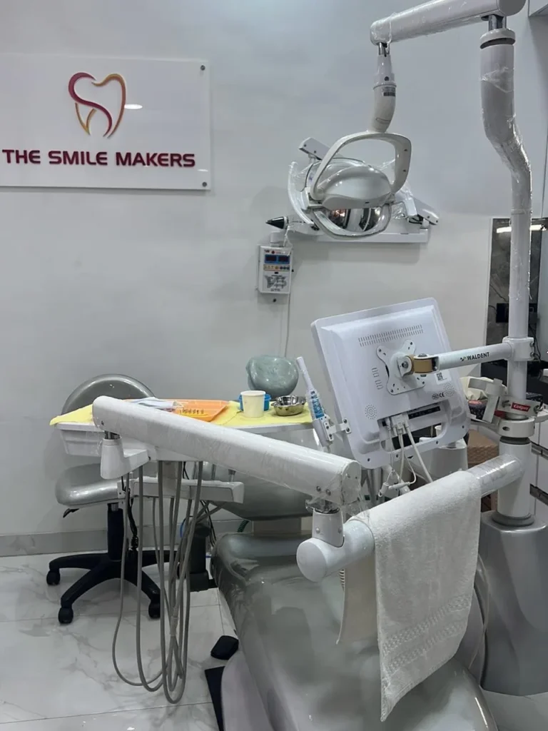 Dental operatory with chair and light at The Smile Makers Dental Clinic, Khar West